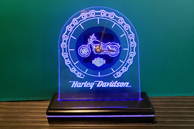 Custom engraved clock with Harley-Davidson motorcycle logo from Doug's Engraver's Den Custom engraved clock with Harley-Davidson motorcycle logo from Doug's Engraver's Den