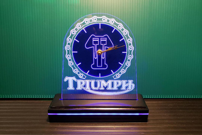 Custom engraved clock with Triumph motorcycle logo from Doug's Engraver's Den Custom engraved clock with Triumph motorcycle logo from Doug's Engraver's Den
